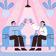 two coworkers celebrating with a cup of coffee